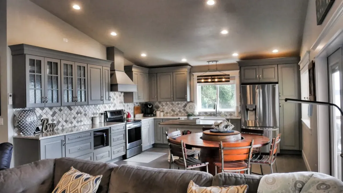 a kitchen with a couch and a table