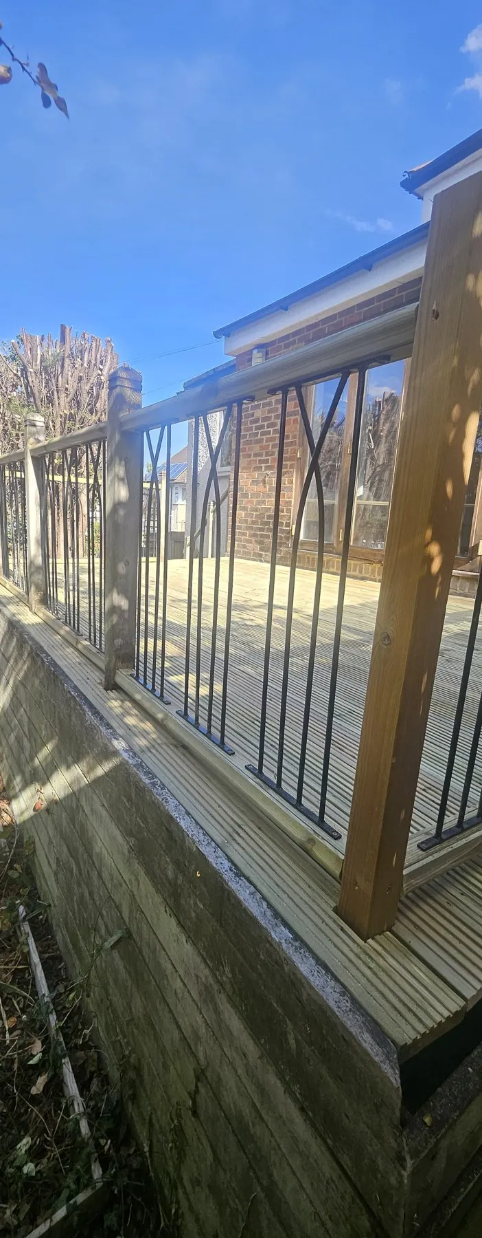 Completed decking with timber railing