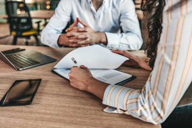Denton County couple meeting with a collaborative divorce attorney to discuss their legal options