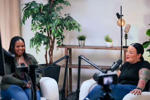 Jennifer Battle and Fiorella Zengotita recording the Bras Off Podcast