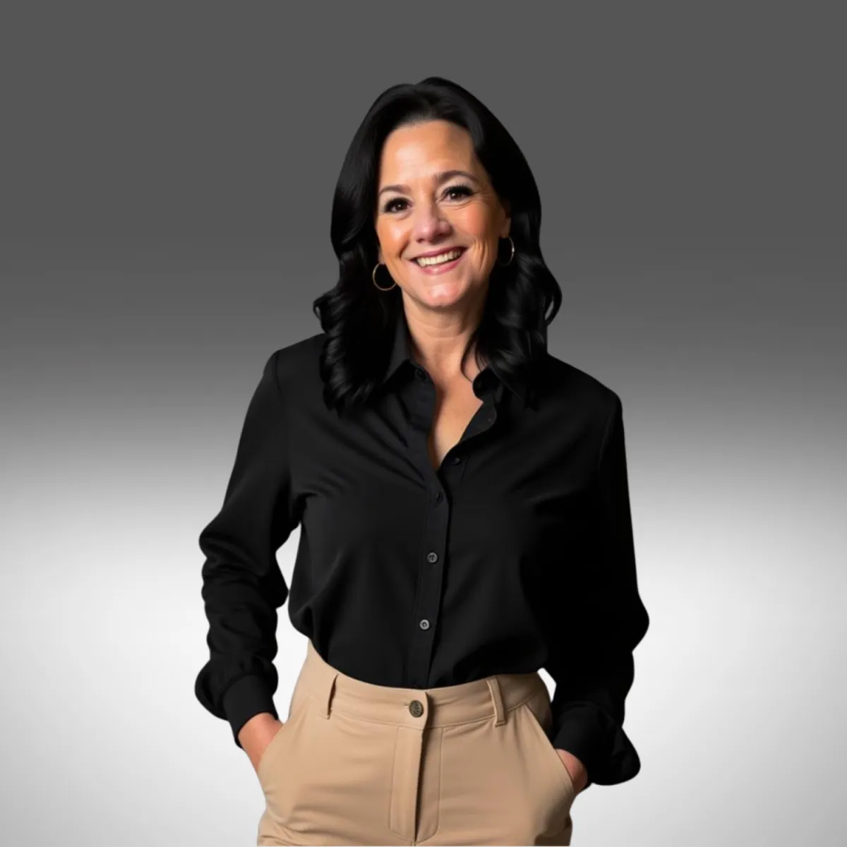 Woman with long dark hair wearing a white shirt, smiling in front of a white and pink sparkly background