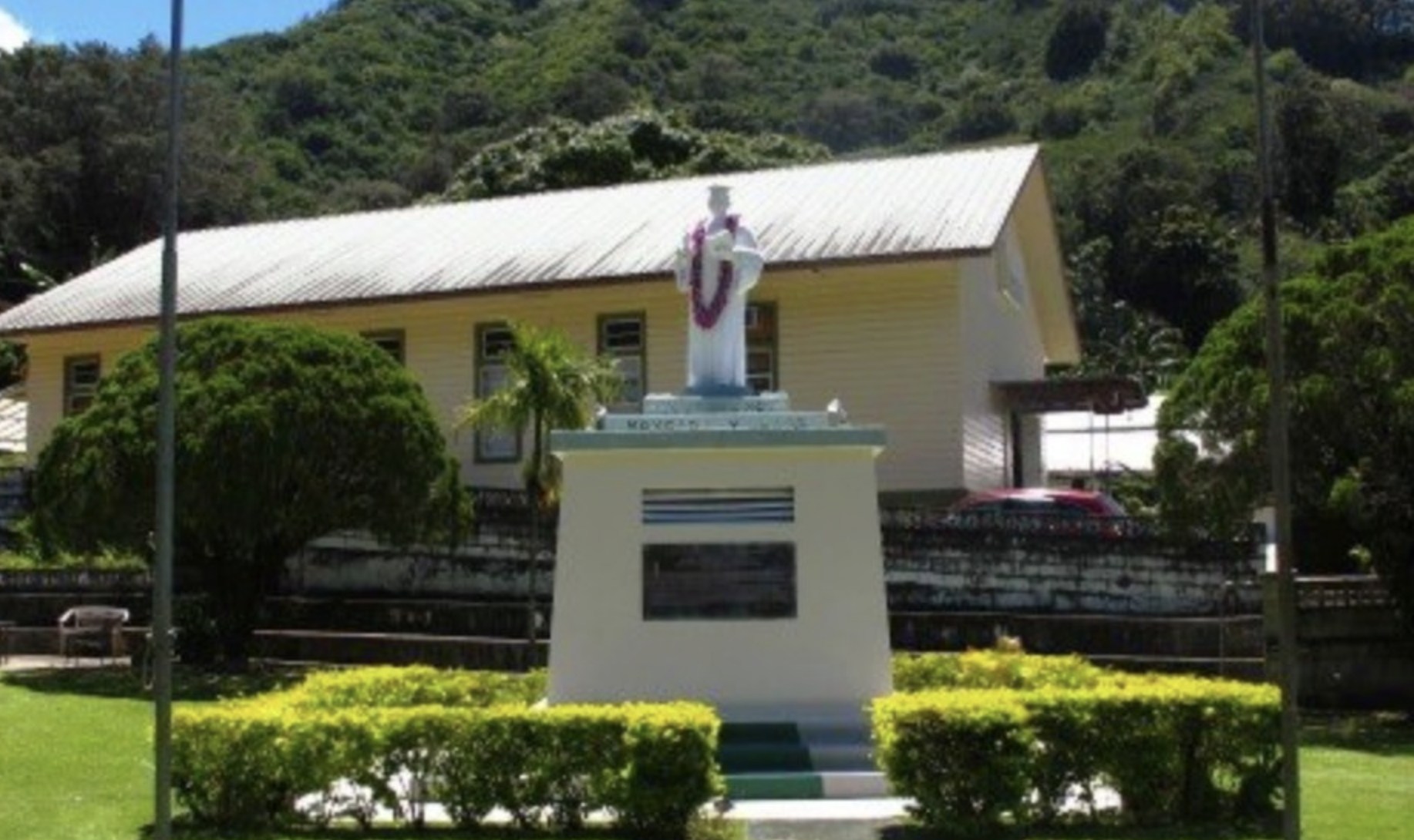 A formal portrait of the Moncado Preservation Society founders, three Filipino elders in traditional attire, standing together in a lush garden. Their expressions are proud and welcoming, symbolizing leadership and cultural stewardship.