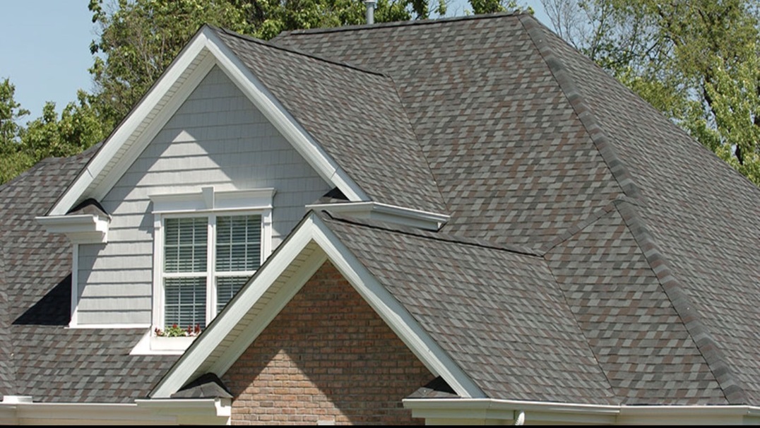 Asphalt shingle roofing installed on a residential home for reliable storm protection