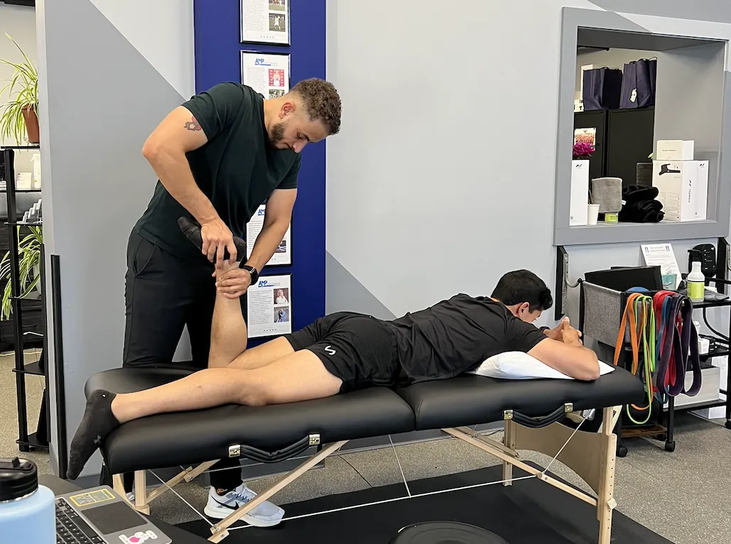 Physical therapist evaluating hip pain to identify the root cause of pain