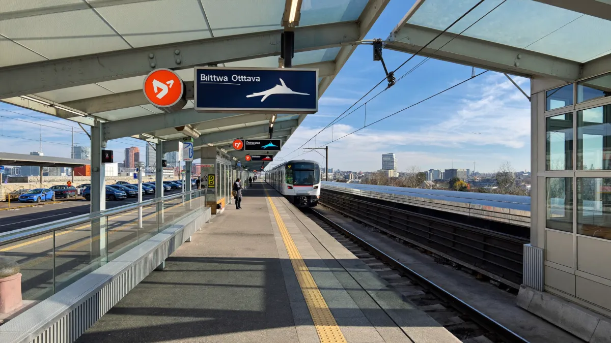Modern light-rail transit station in east-end Ottawa on a bright clear morning