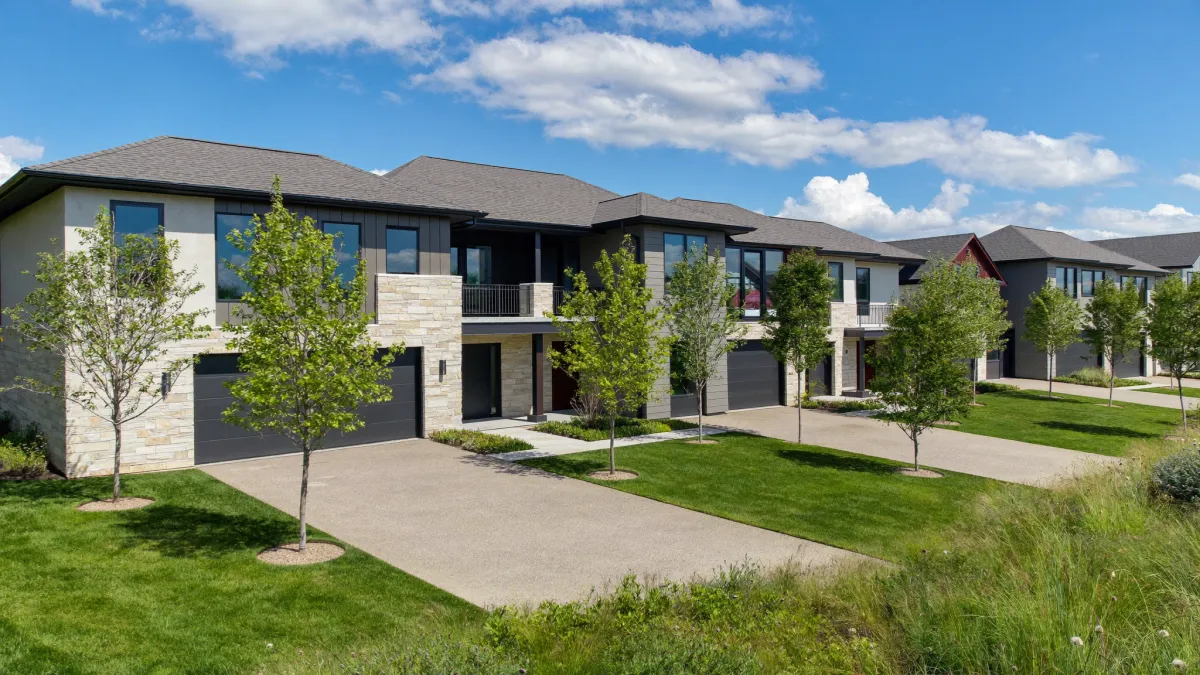 Brand-new subdivision of modern homes in Orleans, east-end Ottawa, on a bright day