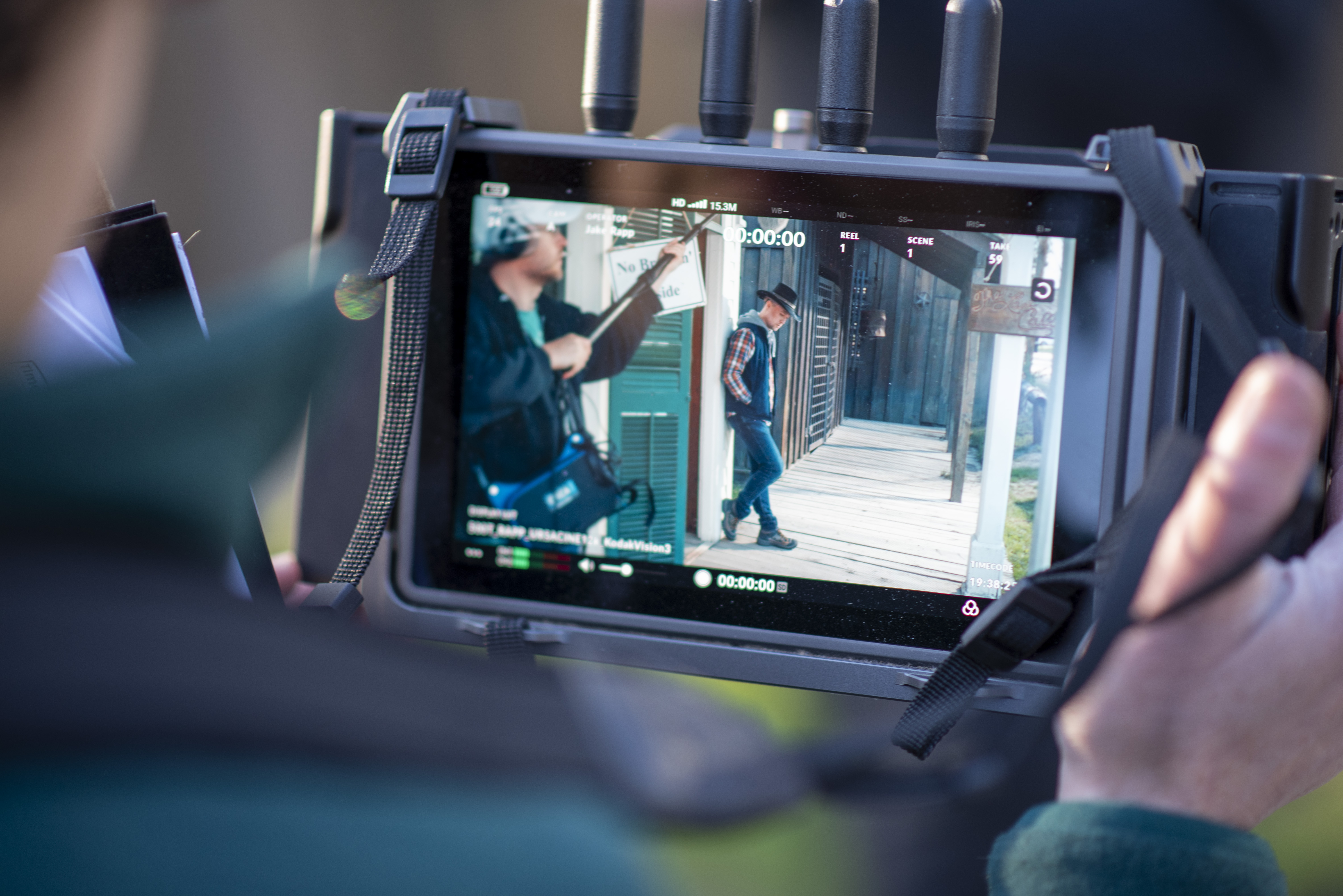 Watching a scene from It's Gonna Be Okay Corral on a director's monitor