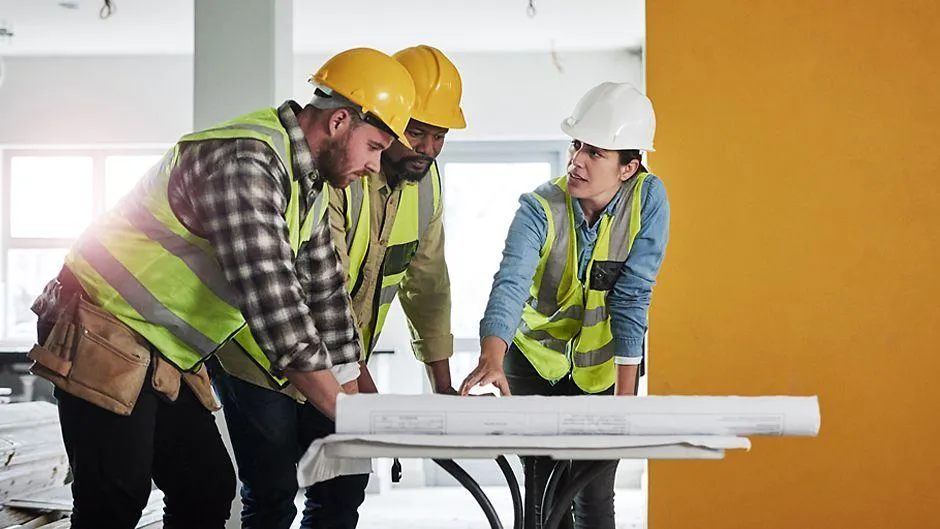 an aerial view of a road and a field