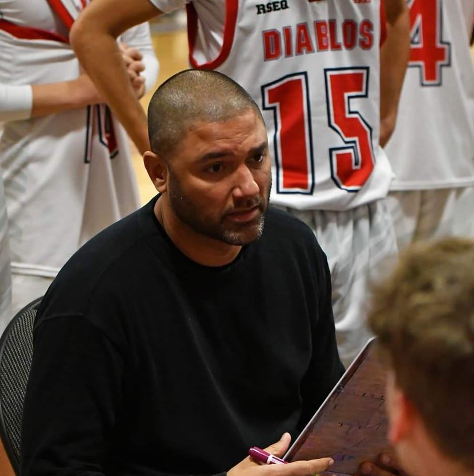 Professional headshot of Coach Docter, basketball consultant
