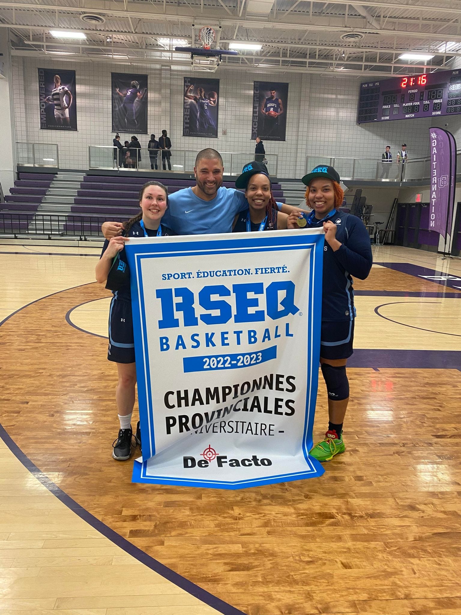 Coach Docter celebrating an RSEQ provincial university basketball championship