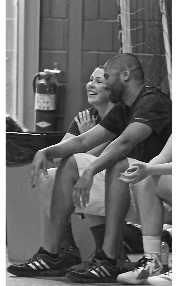 Coach Docter sharing a moment with a player