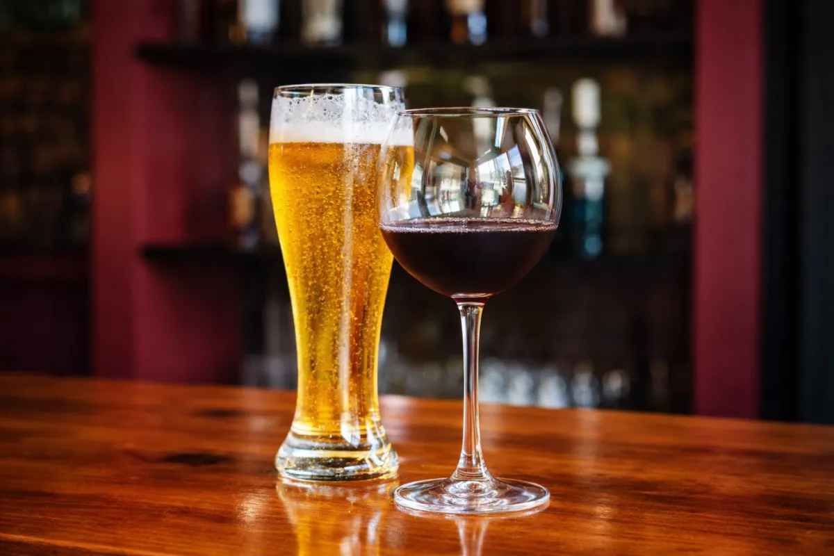 Bartender serving drinks at a warm, intimate event