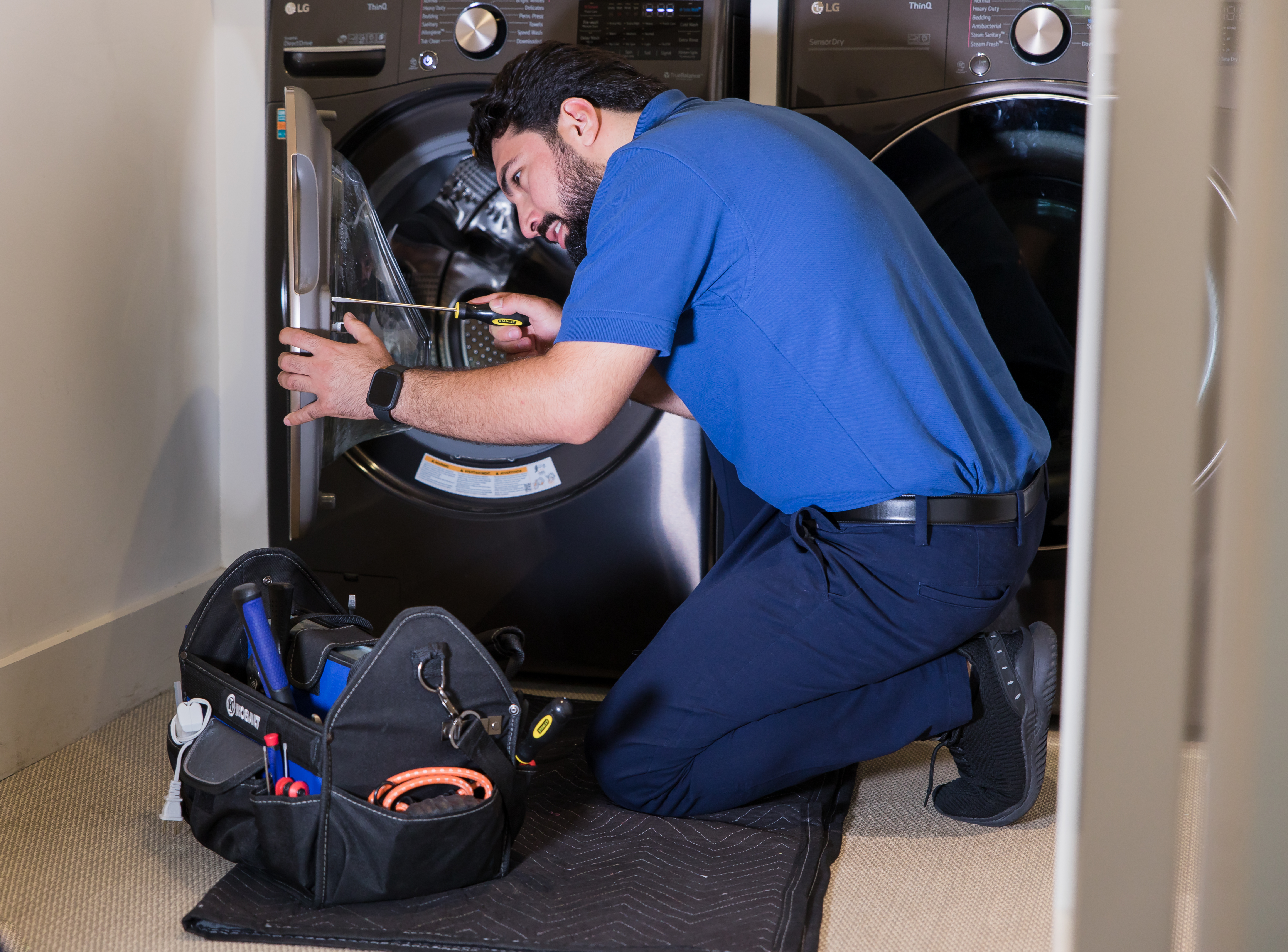 Workshop tools are scattered on a work table.