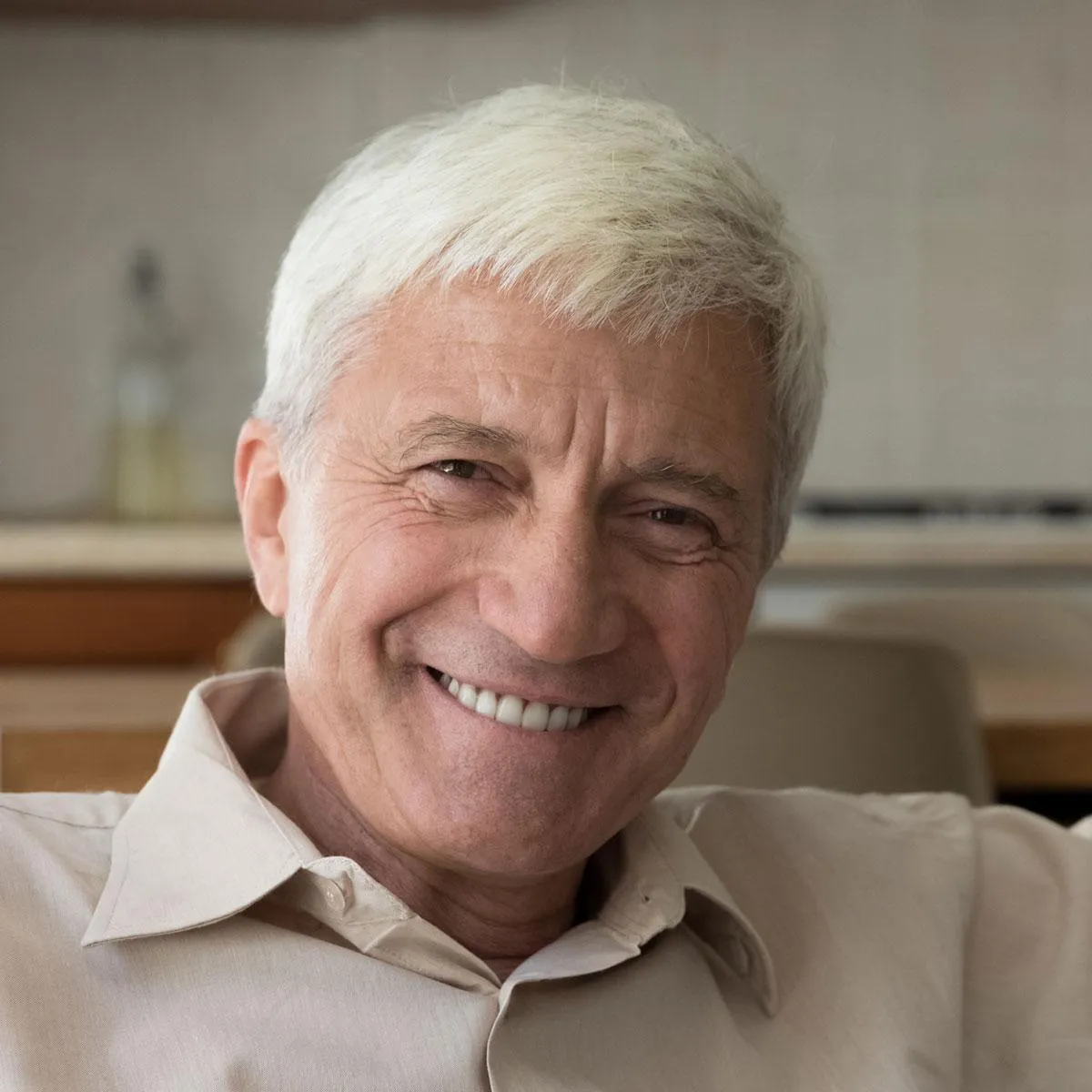 Photo of man with white hair