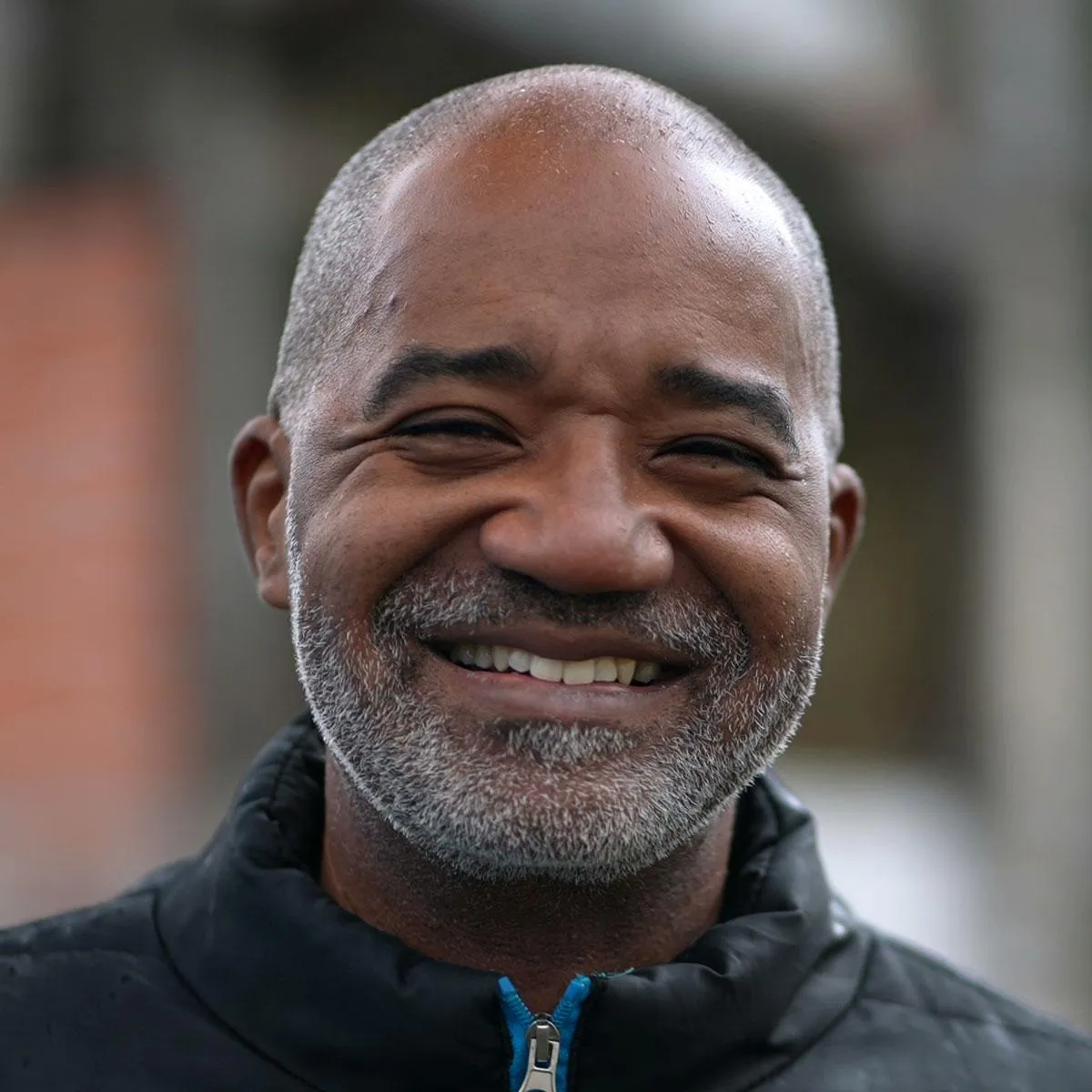 Photo of a man with short hair and short beard