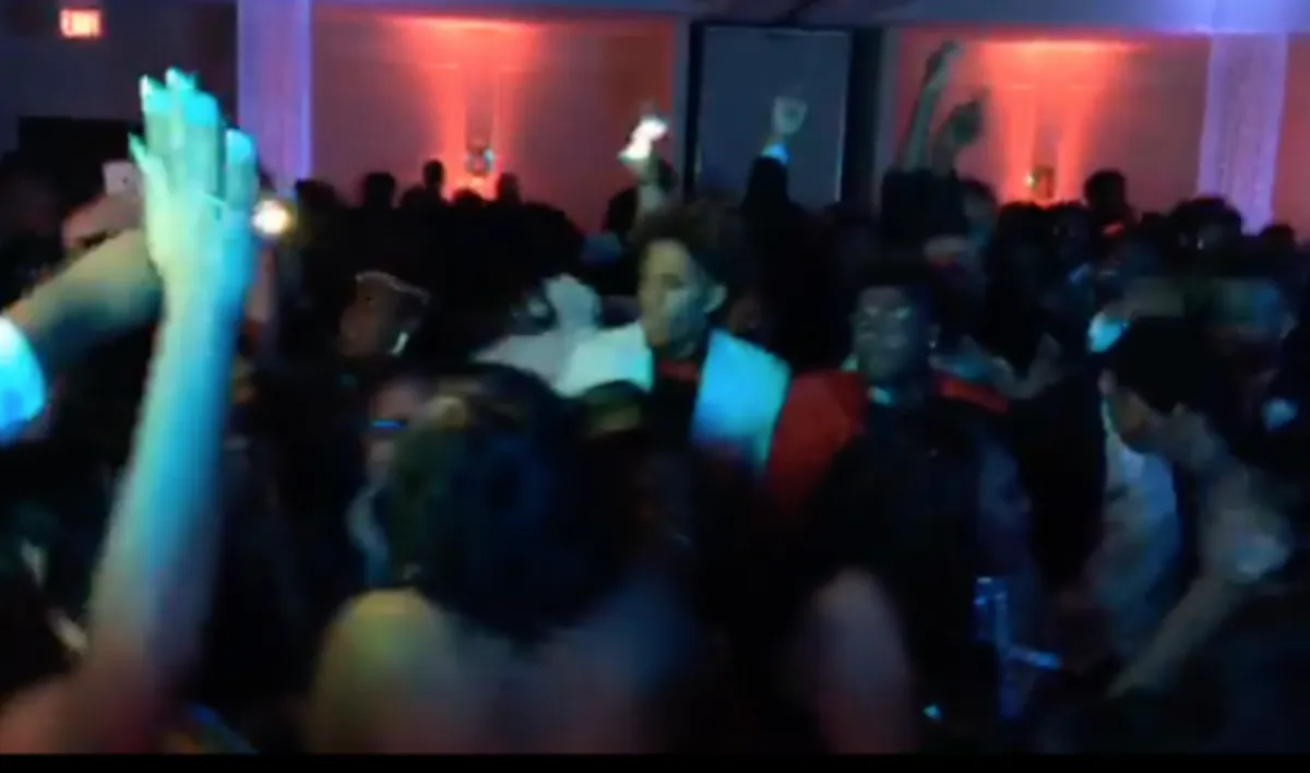 crowd of people gathering in a party