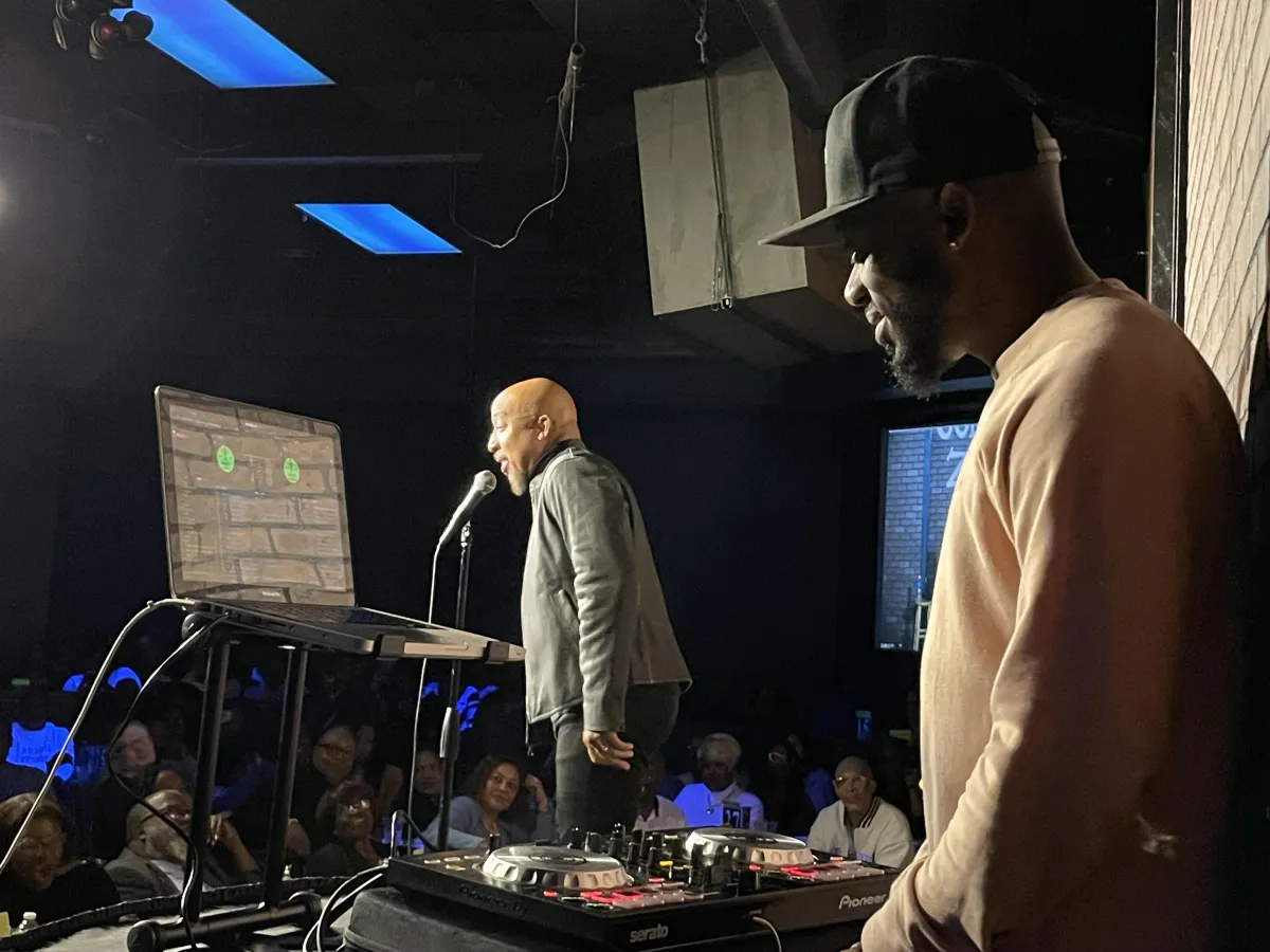 person using DJ mixer