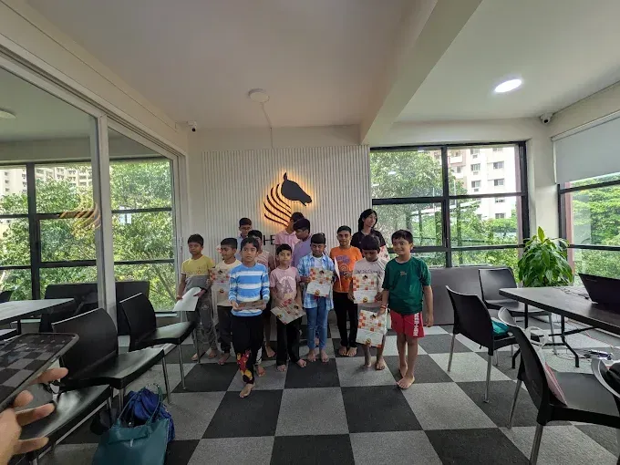 Students at CHESS KLUB with certificate on the class