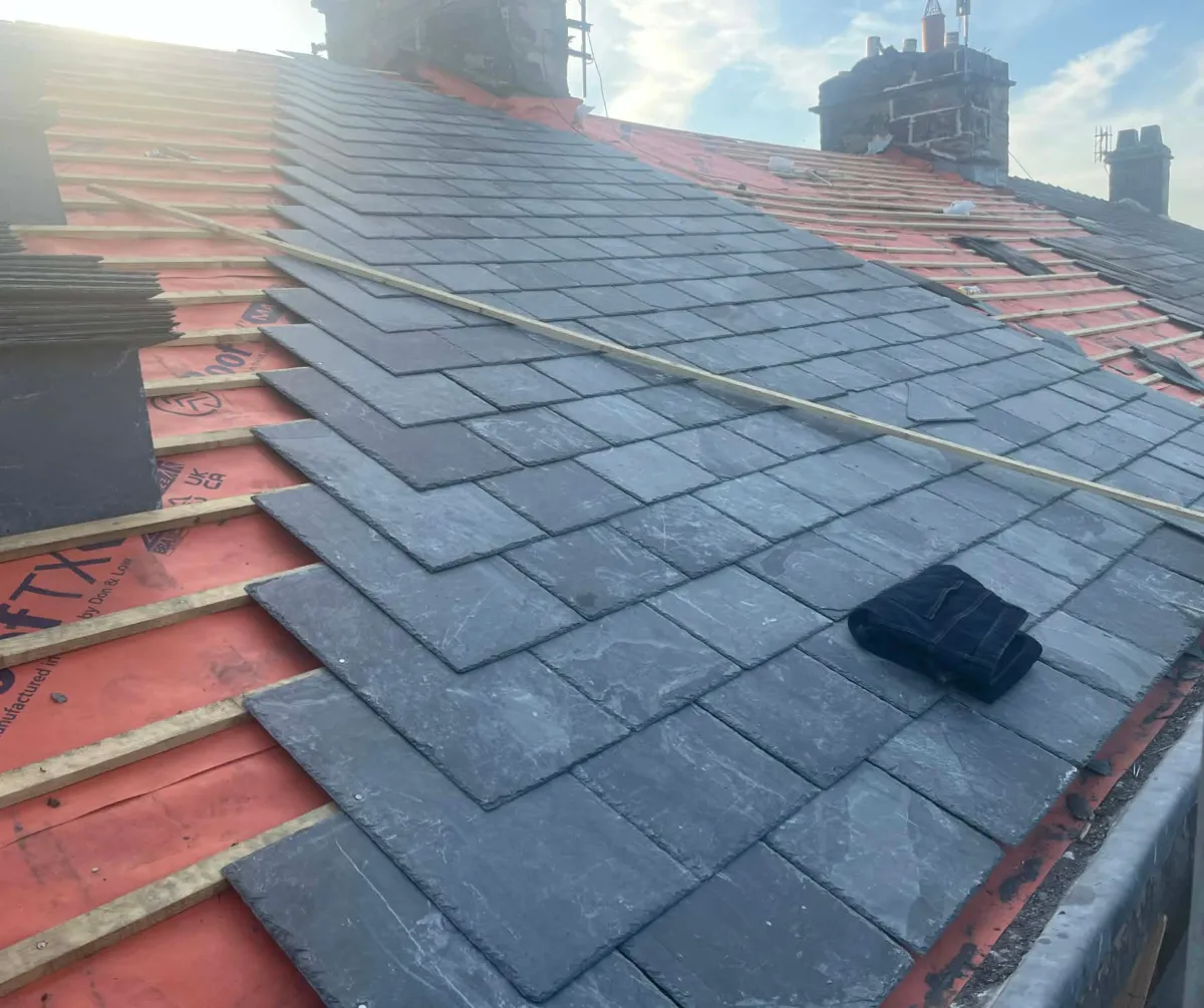 New slate roof installation in progress on property in Lancashire