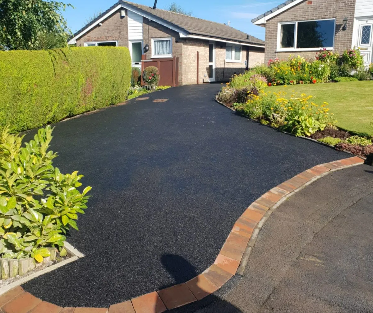 Machine laid tarmac driveway installation at home in Lancashire