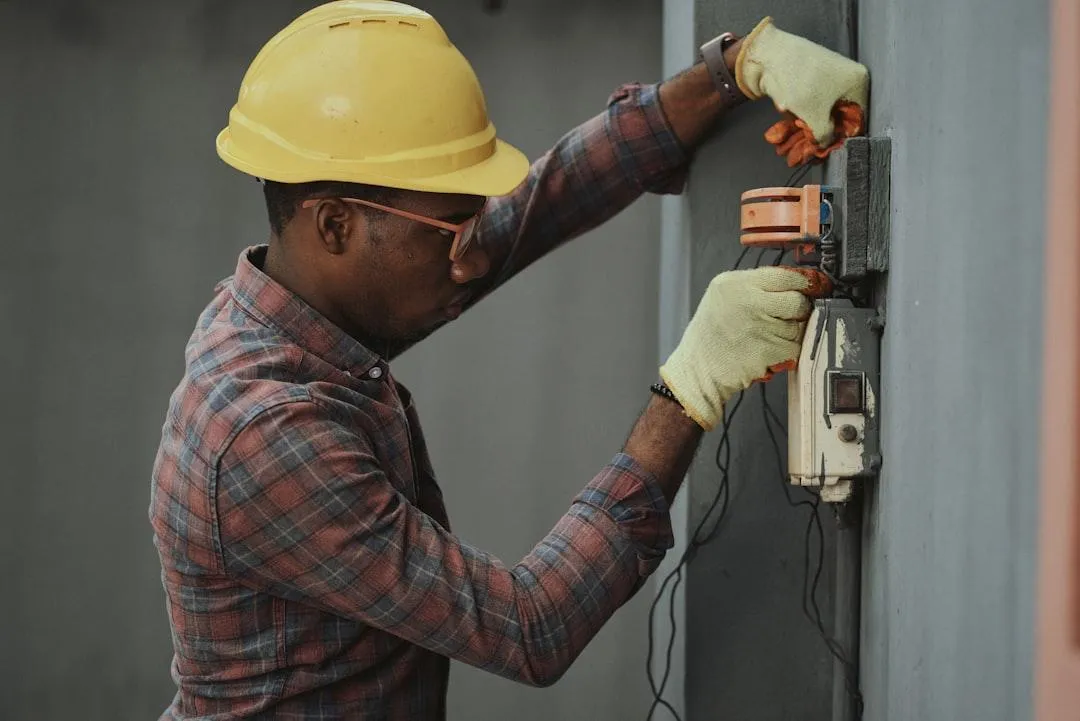 Certified HVAC technician installing a new heating and cooling system in Boyds, MD, ensuring energy-efficient performance.