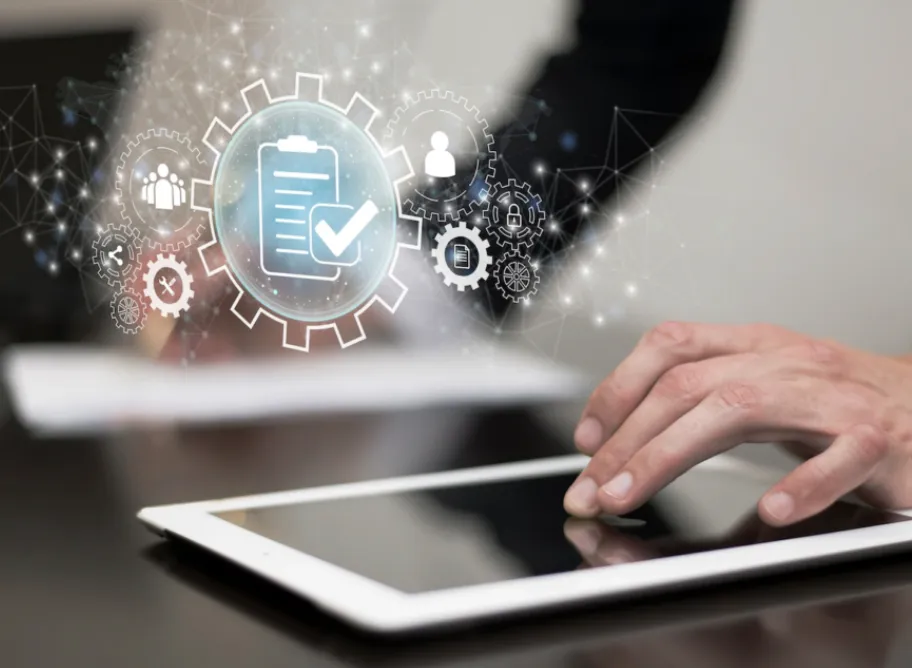 Doctor consulting patient via video call on laptop.