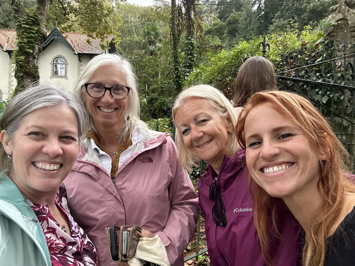 Retreat guests smiling together in Sintra at Carri Richard's Portugal retreat