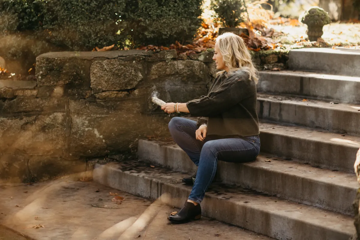 Jessica in reflective moment outdoors