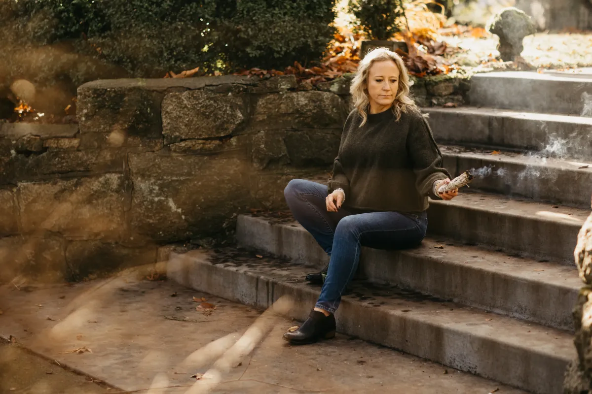 Portrait of Jessica in contemplative pose outdoors