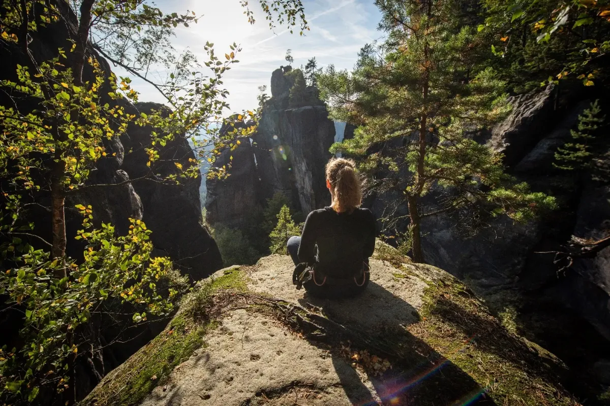 Someone seated outdoor enjoying nature