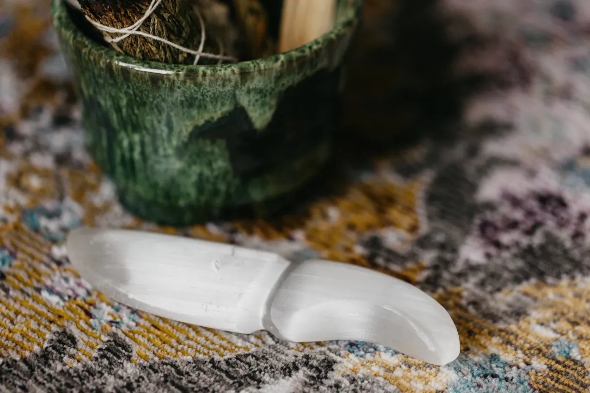 Candles and crystals arranged for a healing ritual