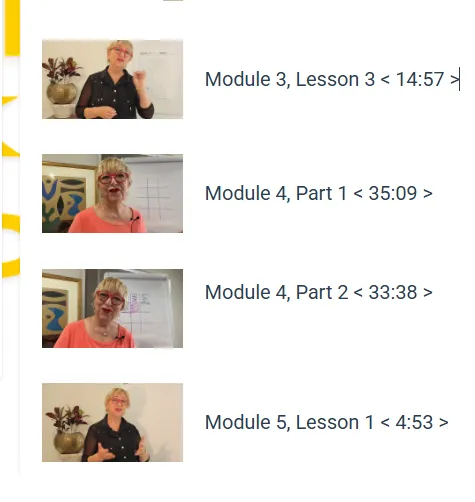 baby sitting on bed while reading on book