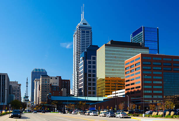 three white CCTV cameras mounted on wall