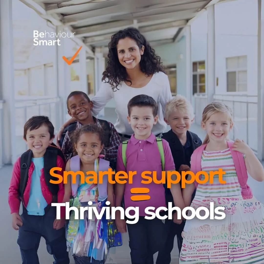 Teacher walking with smiling pupils beside the Behaviour Smart logo, featuring the 'Smarter Support = Thriving Schools' overlay, promoting Behaviour Smart’s behaviour support solutions for UK schools.