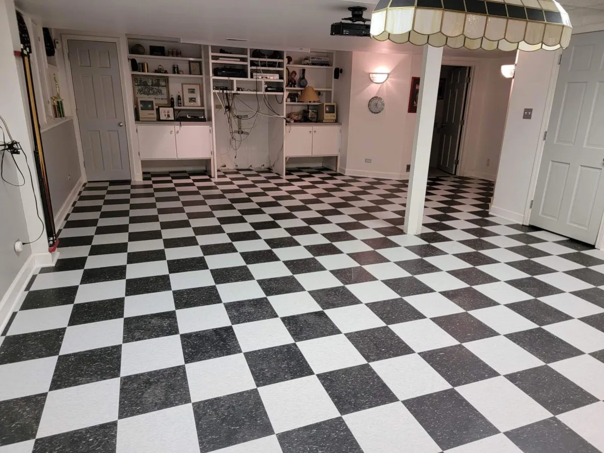 Flooring project finished. White and lack checker floor installed.