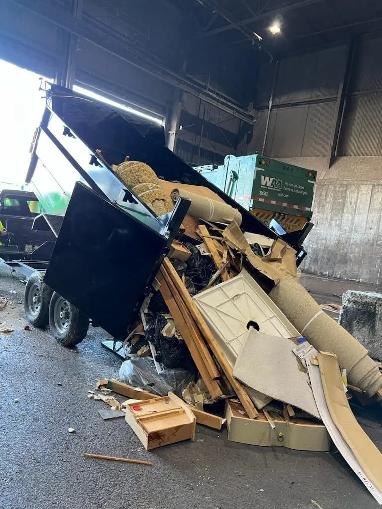 Dump truck dumping debris