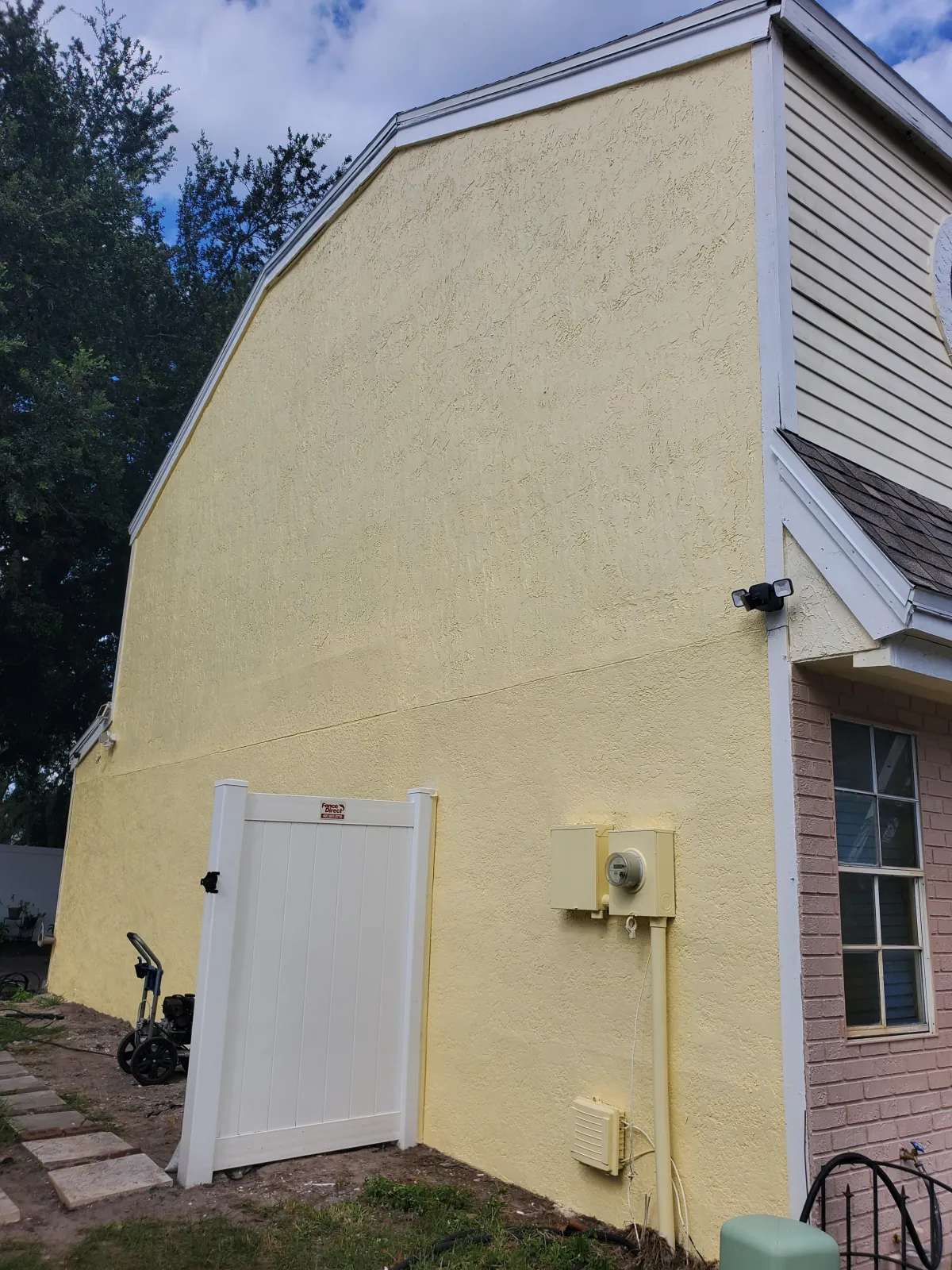 A group of men standing around a wooden cart