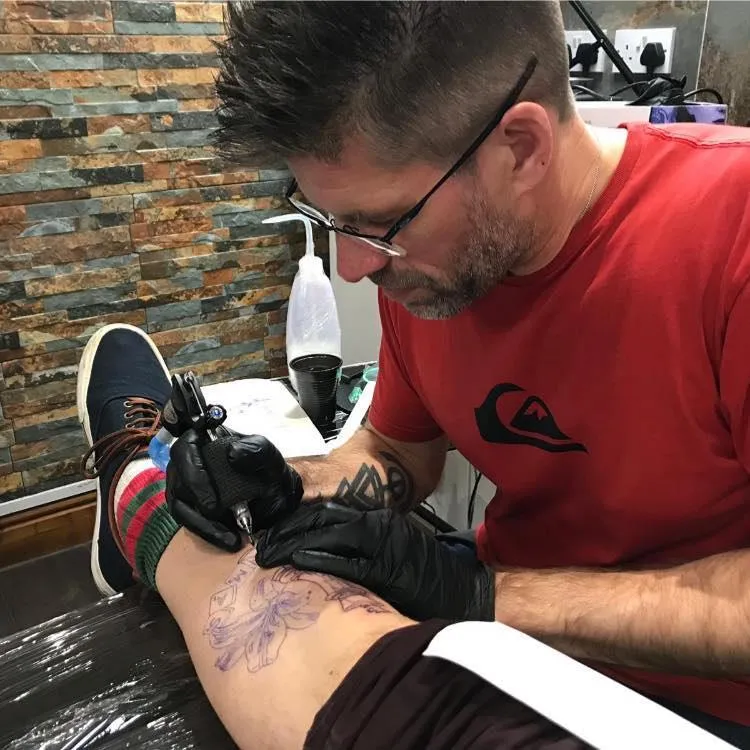 red white and black no smoking sign