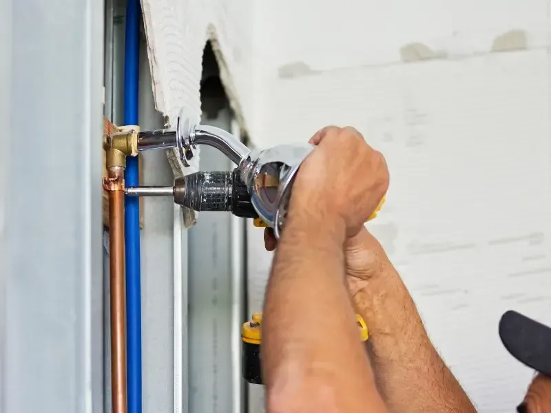 Installing shower pipe for repiping services Mercer Island WA.