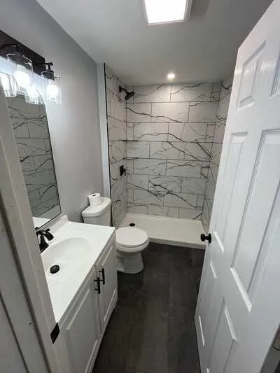 JCM Contracting Bathroom Remodel Bedford MA Modern Tile Shower and Interior Renovation