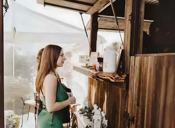 A guest is waiting for a cocktail in front of Bar Solo's mobile bar trailer. This was for an event in Ashtabula, OH