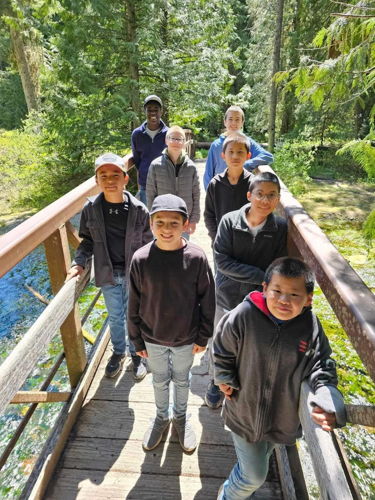 woman placing sticky notes on wall