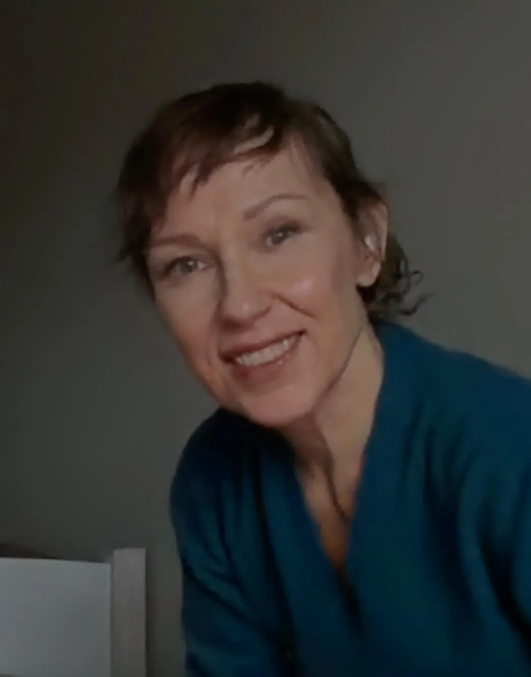 Coach Niina, smiling