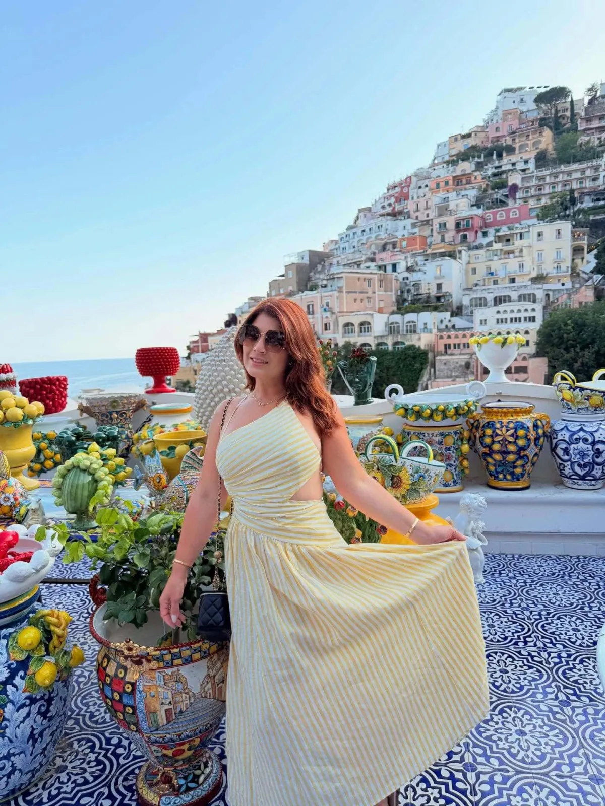 Booked for flavor, arrested by the view as Mariola San Juan from Orlando, Florida enjoys seafood on the Amalfi Coast