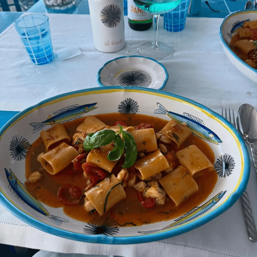 Mariola San Juan, a booked travel food blogger from Orange County Florida, arrested by the rich taste of truffle pasta in Italy