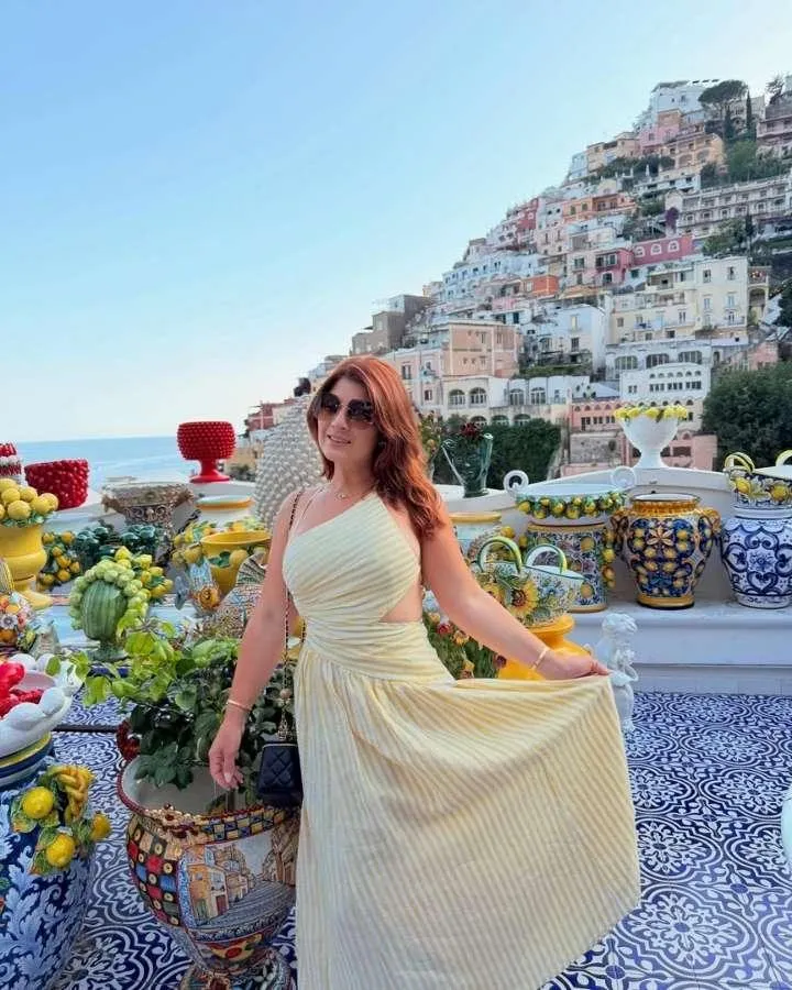 Booked for flavor, arrested by the view as Mariola San Juan from Orlando, Florida enjoys seafood on the Amalfi Coast