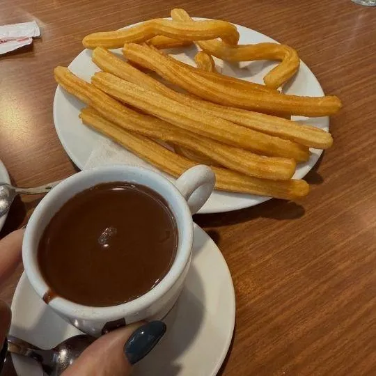Arrested by chocolate cravings, Mariola San Juan from Orange County Florida booked this churros and cocoa treat in Spain
