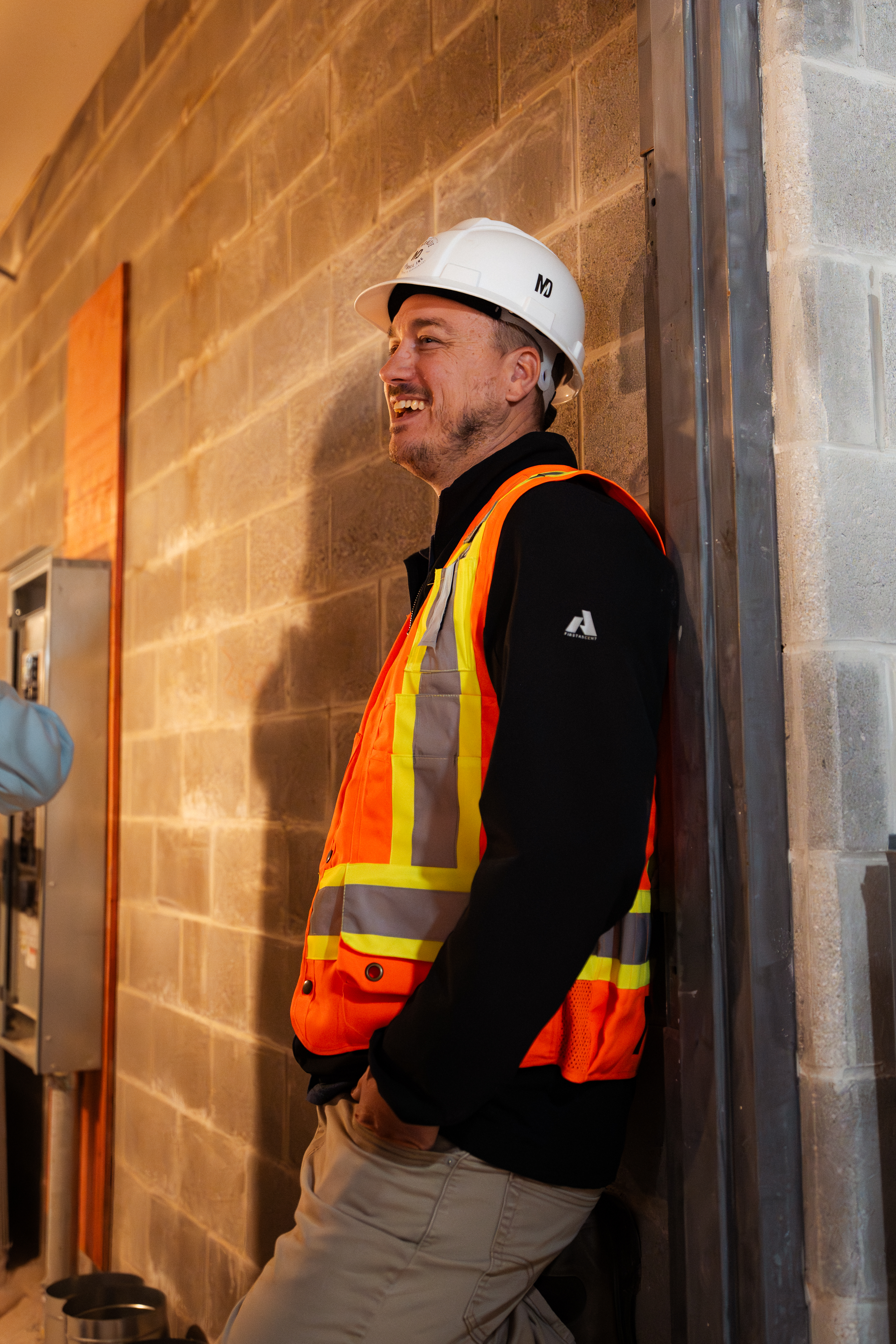 Close-up photo of Doug inside a drywall project looking into the distance