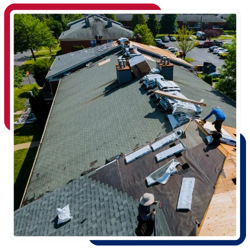 Local roof installation company working carefully on a residential property