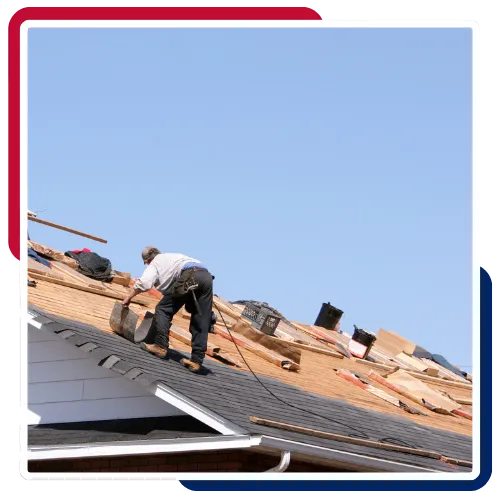 Shingle roof repair service in Bay Shore, NY with workers fixing worn roof sections
